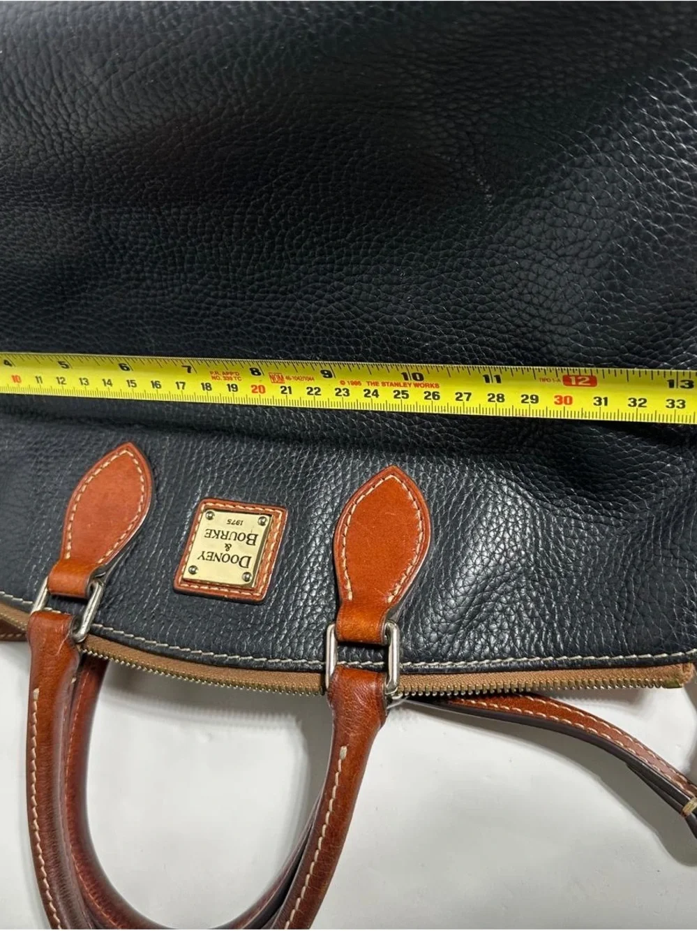 Dooney & Bourke Black Pebbled Leather Satchel with Brown Trim